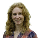 Samantha Abbott, a nurse practitioner at NHC Milwaukie Medical Clinic, smiles at the camera