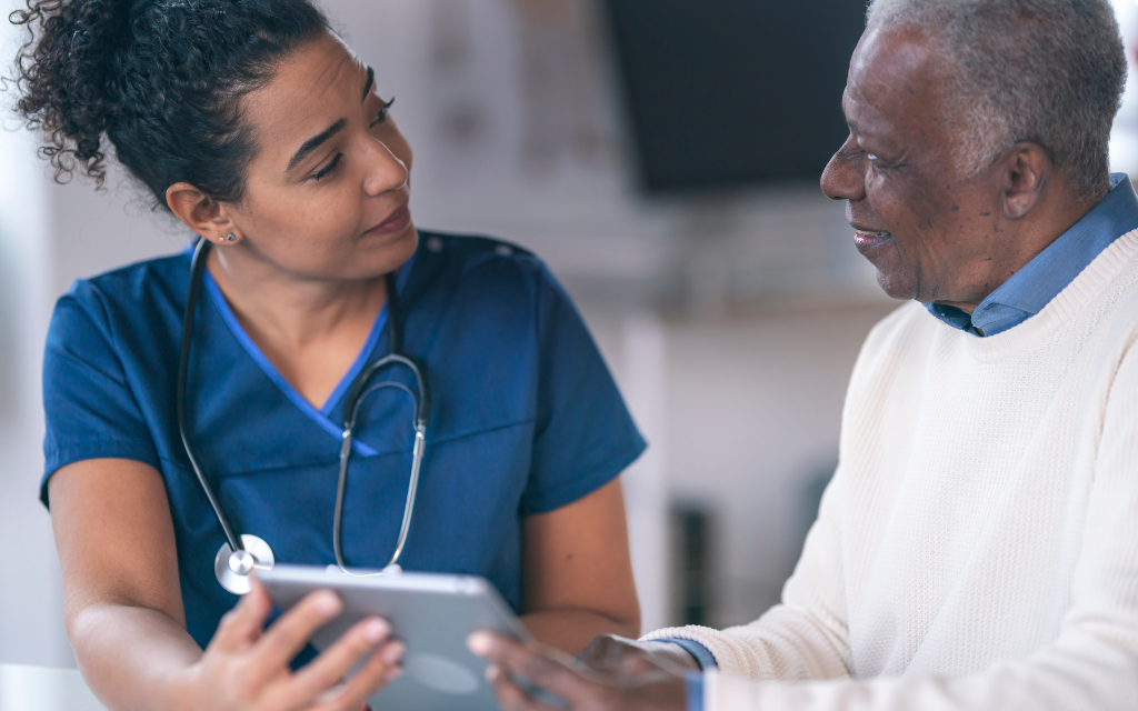 a healthcare provider chatting with a patient
