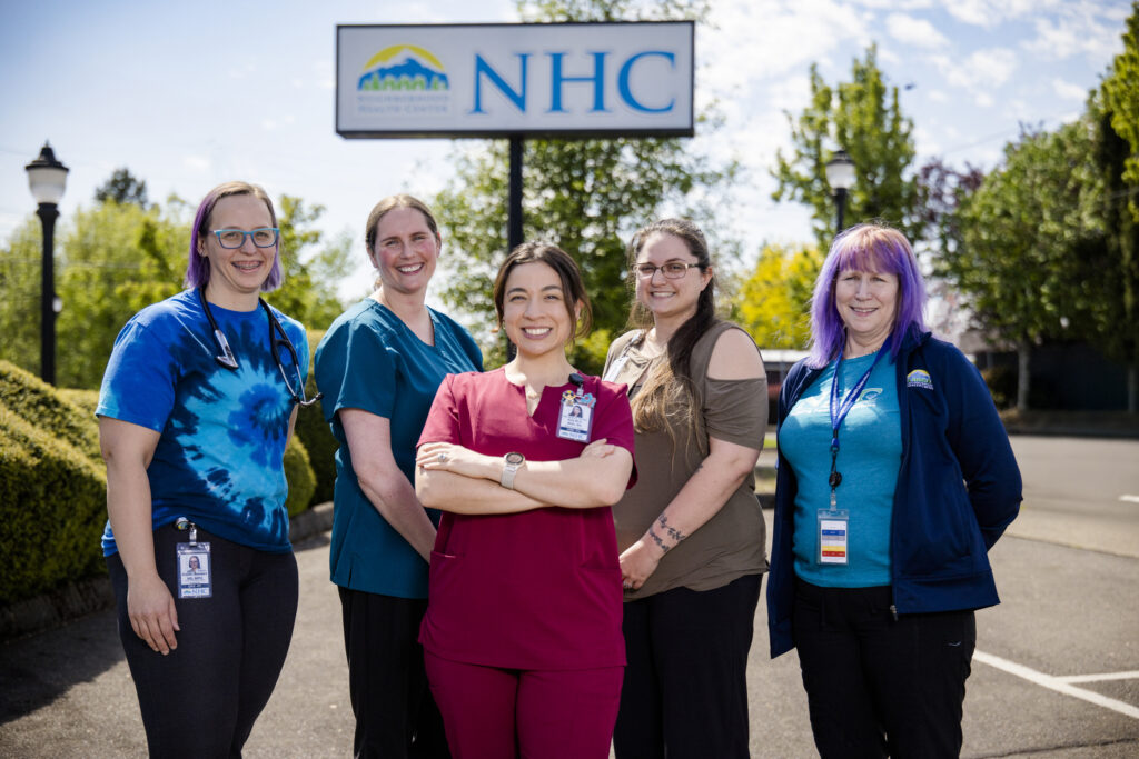 _T7A0816 a group of five care team members in healthcare