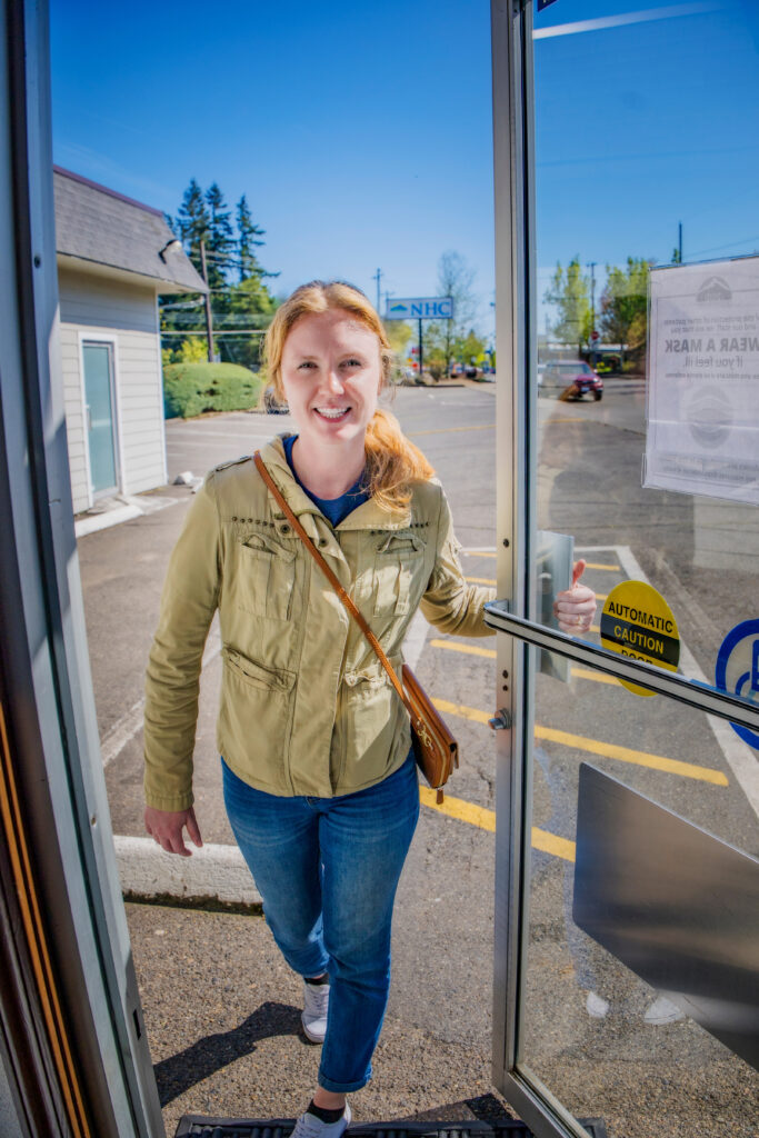 person walking into a federally qualified health center