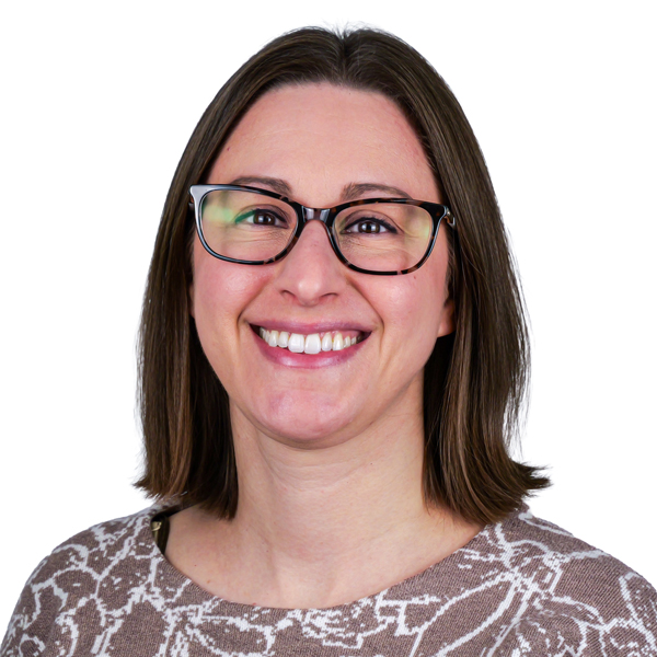 AJ Lewis, Dental Hygienist, smiling.
