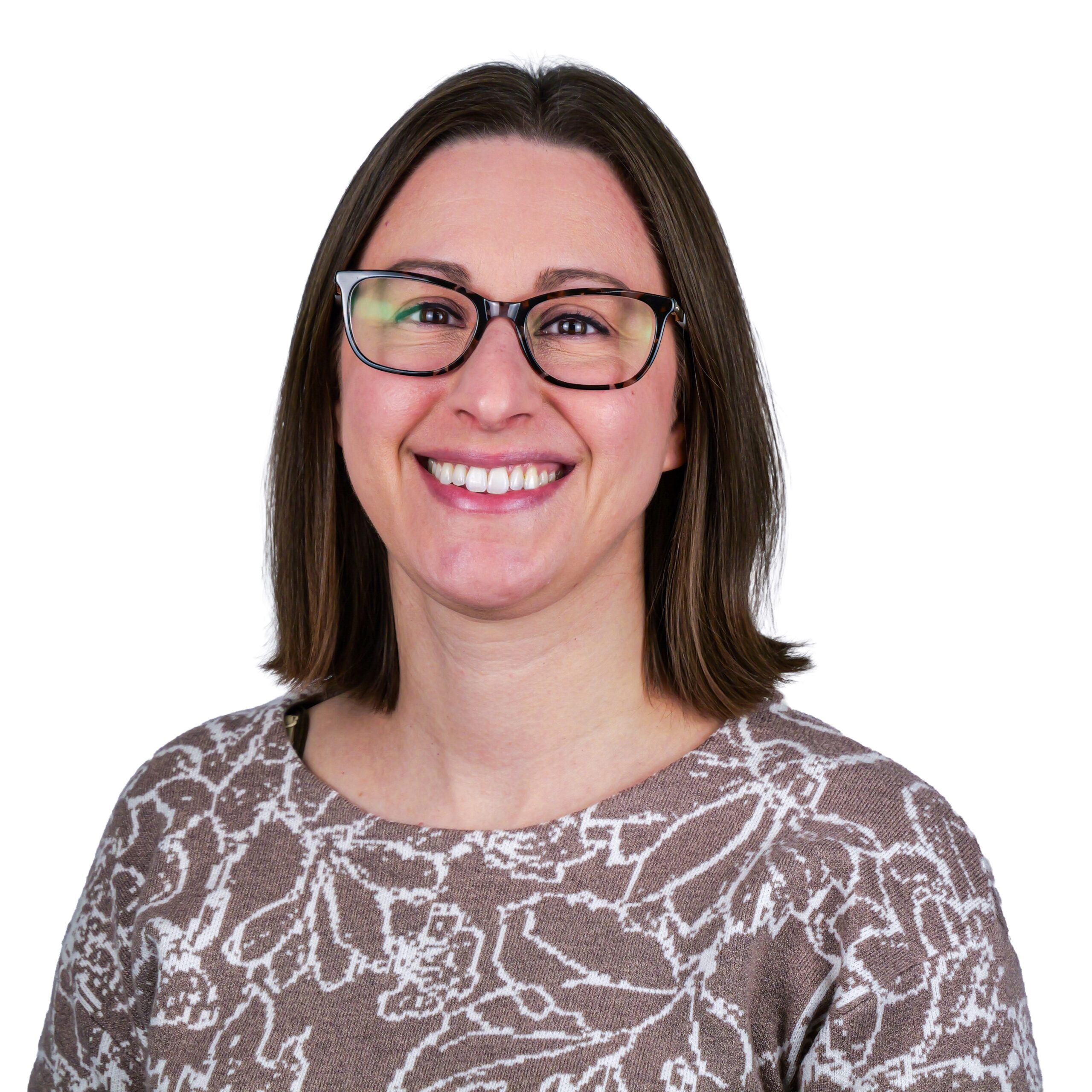 Anna Lewis, Dental Hygienist, smiling.