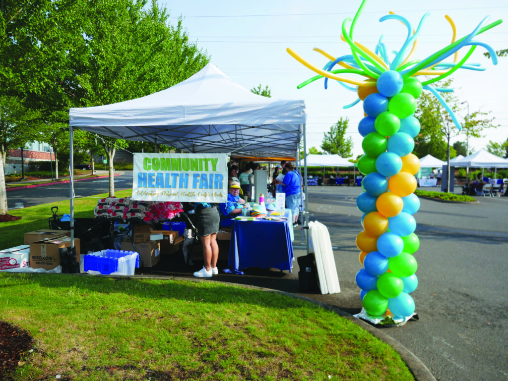 the welcoming table at the nhc health fair in tanasbourne