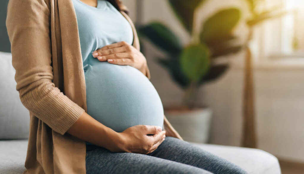 close up of a pregnant woman's stomach