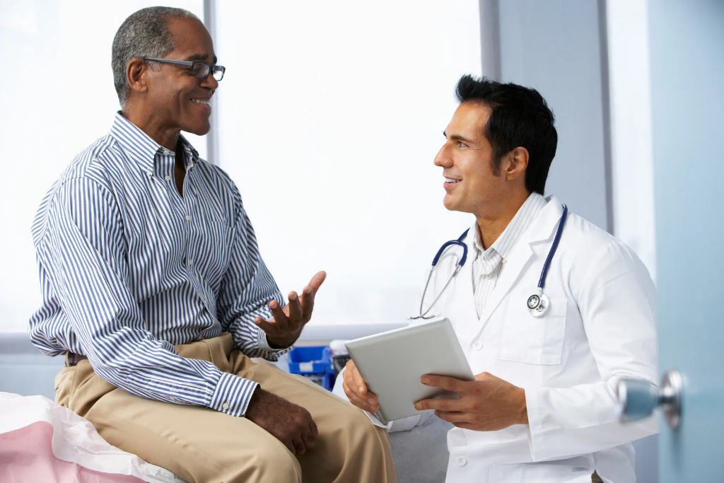 doctor chatting with their patient during an appointment